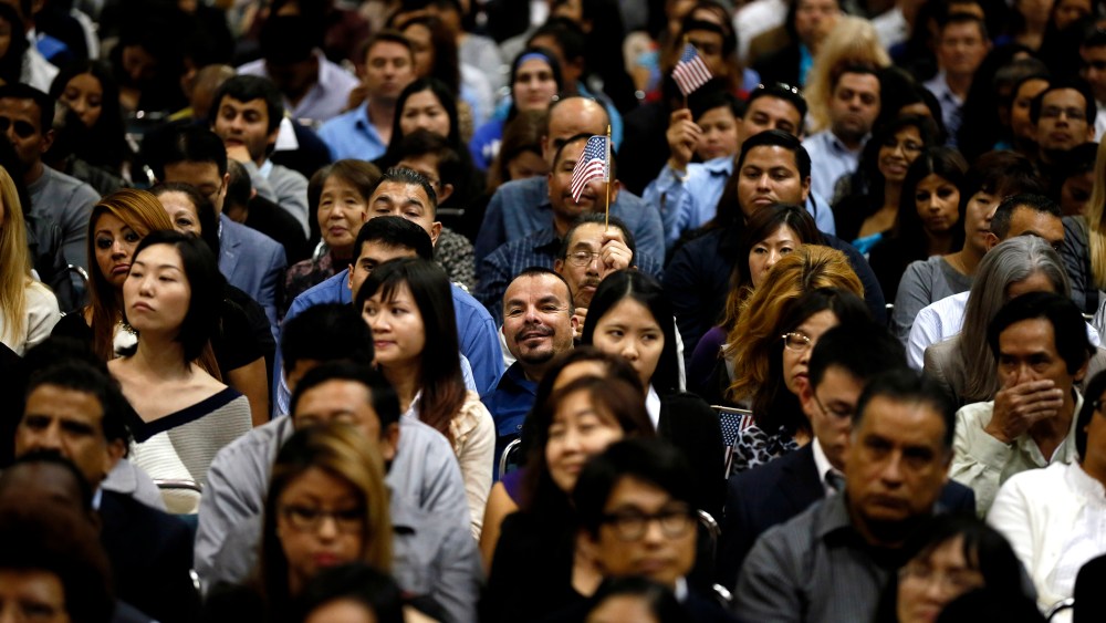 Immigrants take part in a naturalization ceremony for new U.S. citizens in Los Angeles