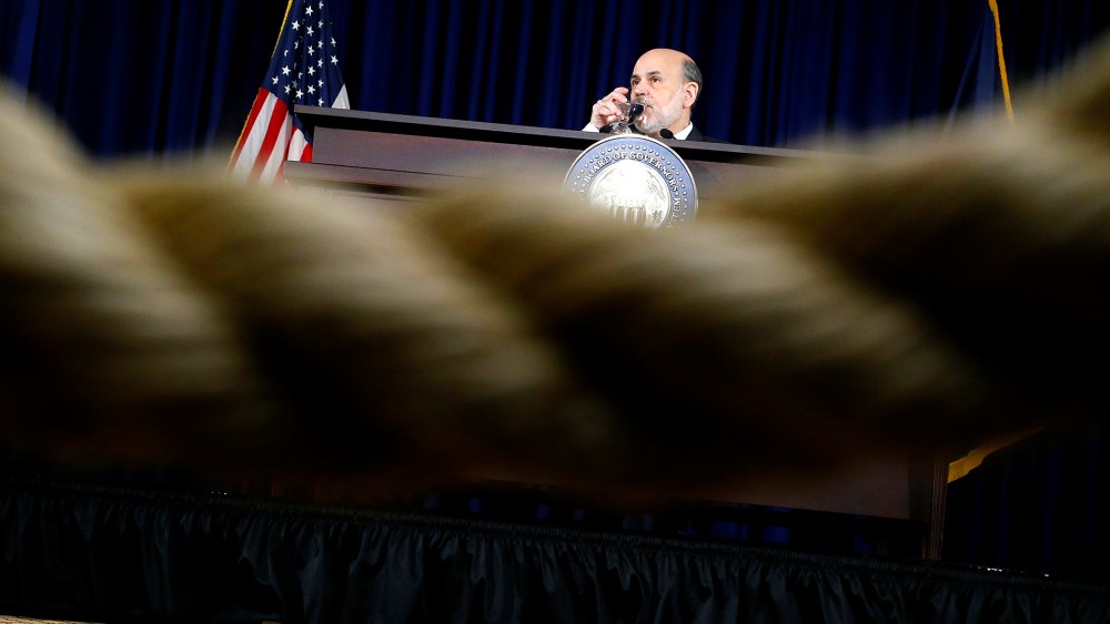 U.S. Federal Reserve Chairman Ben Bernanke during his final planned news conference before his retirement, at the Federal Reserve Bank headquarters in Washington, Dec. 18, 2013.