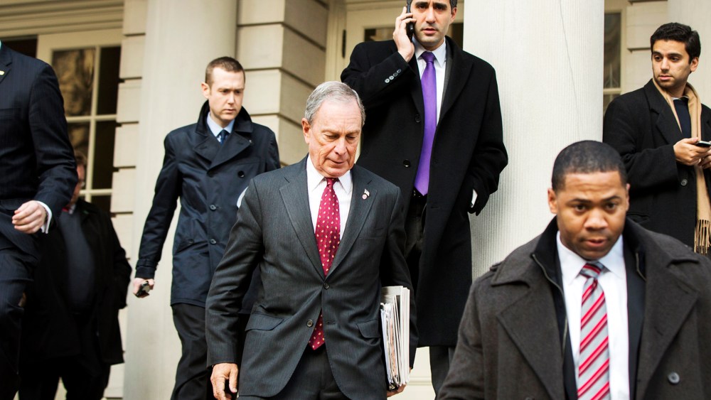 New York City mayor Michael Bloomberg departs City Hall, Dec. 19, 2013.