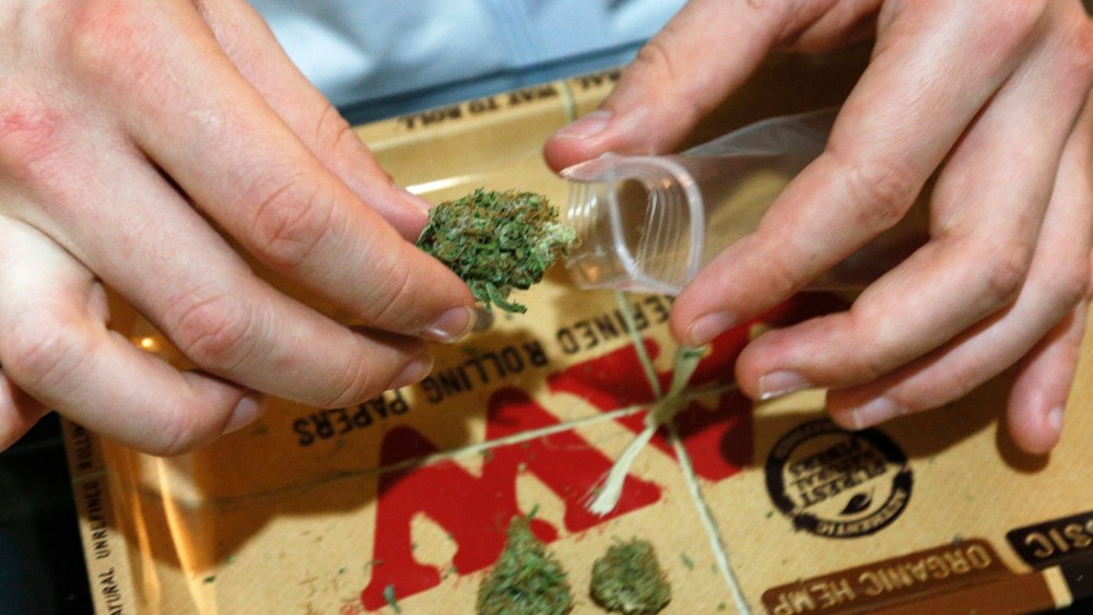 Marijuana buds are packaged for sale at the Botanacare marijuana store ahead of their grand opening in Northglenn, Colorado Dec. 31, 2013.