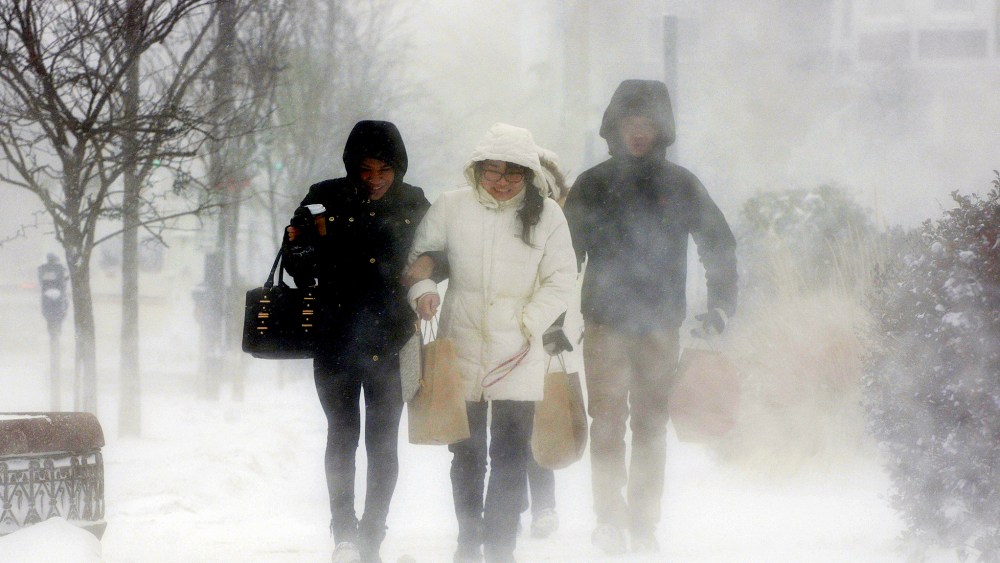 Elmwood Village residents after purchasing necessities from a grocery store, Buffalo, N.Y., Jan. 7, 2014. A deadly blast of arctic air shattered decades-old temperature records as it enveloped the eastern U.S. (Photo by Don Heupel/Reuters)