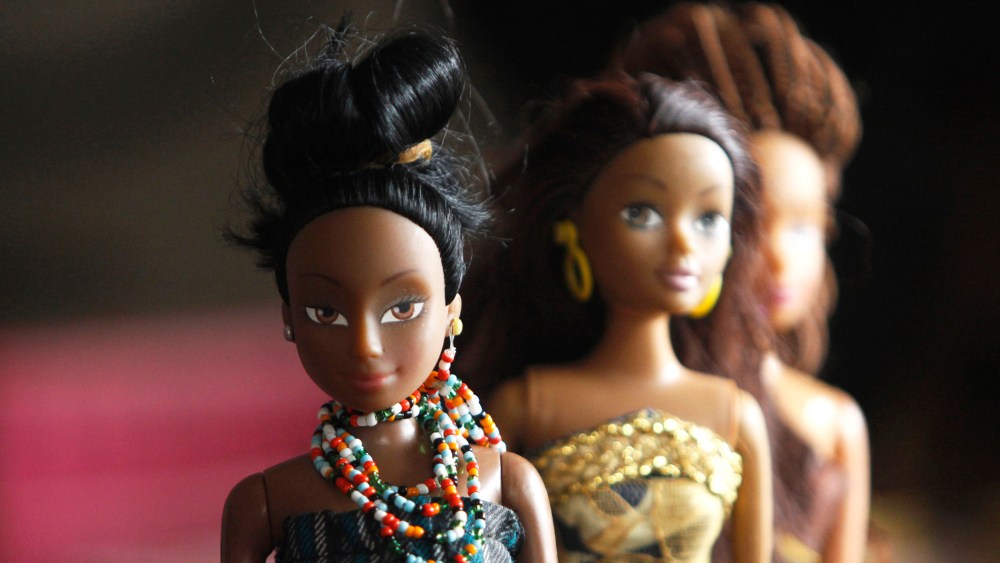 A bead necklace is seen on a doll dressed in local attire, in a workshop in Surulere district, in Nigeria's commercial capital Lagos on Jan. 8, 2014. (Photo by Akintunde Akinleye/Reuters)