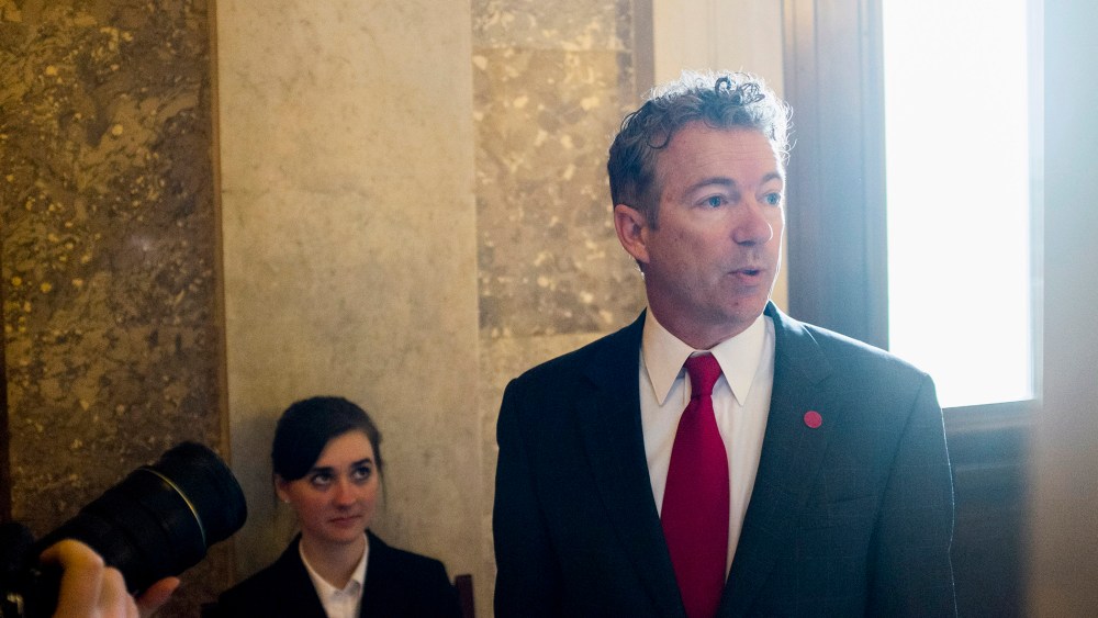 Senator Rand Paul arrives for the Republican weekly policy luncheon on Capitol Hill in Washington, jan. 28, 2014.