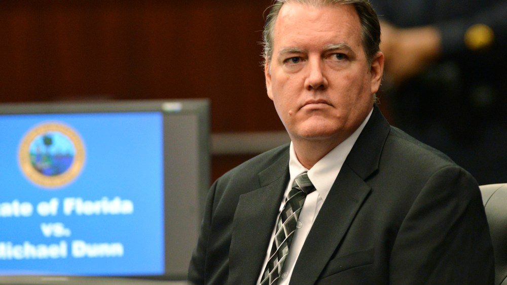 Defendant Michael Dunn looks back at his family on day two of his first-degree murder trial, Feb. 7, 2014, in Jacksonville, Fla.