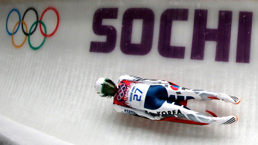 South Korea's Eunryung Sung speeds down the track during the women's singles luge event of the Sochi 2014 Winter Olympic Games, at the Sanki Sliding Center, Rosa Khutor Feb. 10, 2014.