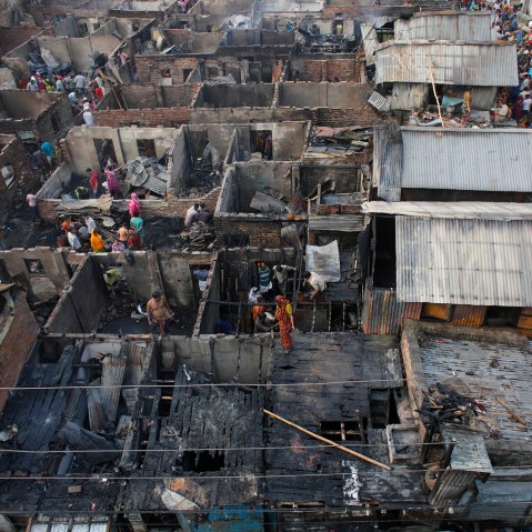 A general view of the wreckage of a slum from the top after a fire broke out, at Mirpur in Dhaka, Bangladesh on Feb. 11, 2014 (Photo by Andrew Biraj/Reuters).