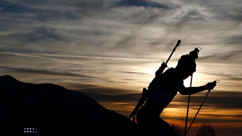 Norway's Tarjei Boe skis during the men's biathlon 20 km individual event at the Sochi 2014 Winter Olympic Games in Rosa Khutor Feb. 13, 2014.