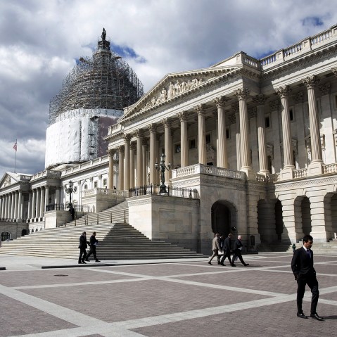 A man walks in front of the U.S. Capitol in Washington April 23, 2015. (Photo by Joshua Roberts/Reuters)