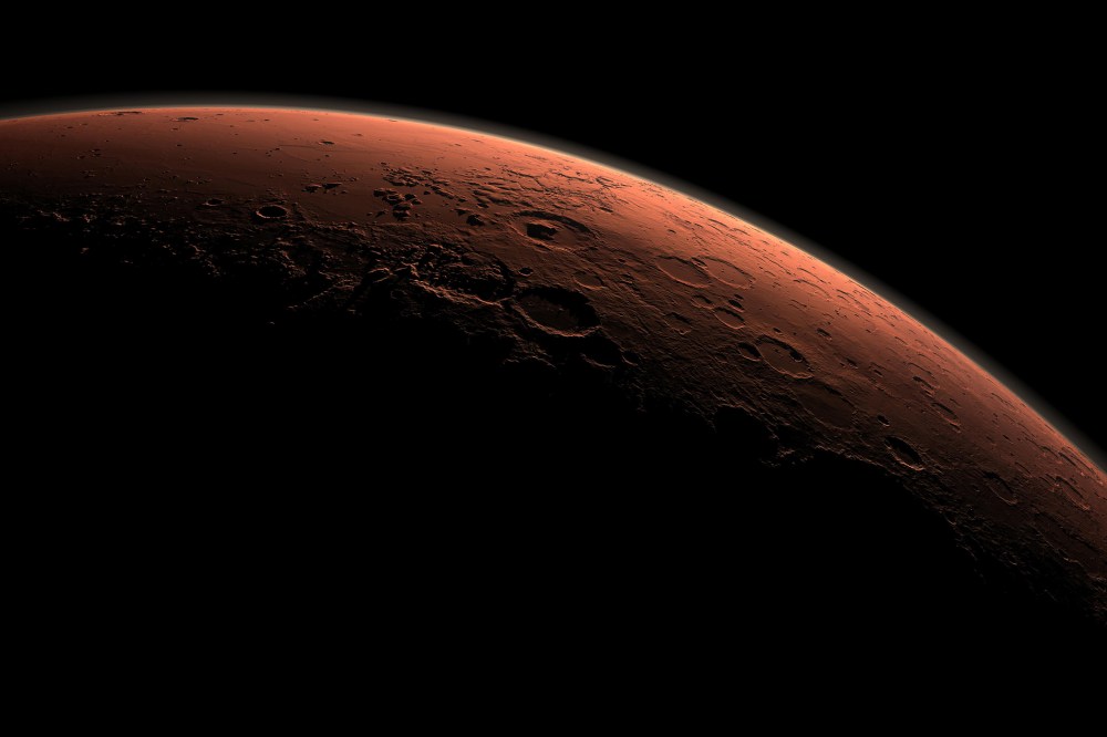 This computer-generated view depicts part of Mars at the boundary between darkness and daylight, with an area including Gale Crater beginning to catch morning light, in this handout image provided by NASA. (Photo by NASA/JPL-Caltech/Reuters)
