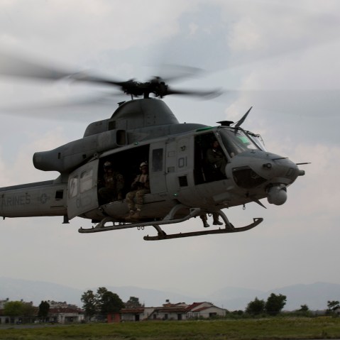 A UH-1Y Huey helicopter flies into the Tribhuvan International Airport after a search and rescue operation in Kathmandu, Nepal, May 13, 2015. (Photo by Thor J. Larson/U.S. Marine Corps/Handout/Reuters)