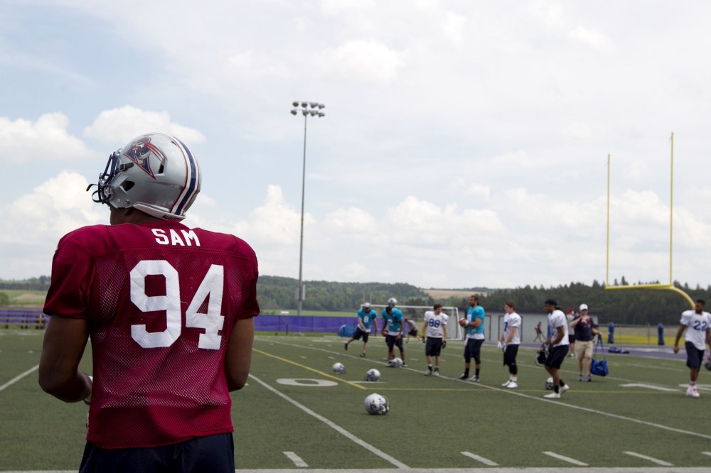 Michael Sam, newly signed defensive end for the Montreal Alouettes CFL football team, arrives on the field for rookie training camp in Sherbrooke, Quebec, May 27, 2015. (Photo by Christinne Muschi/Reuters)