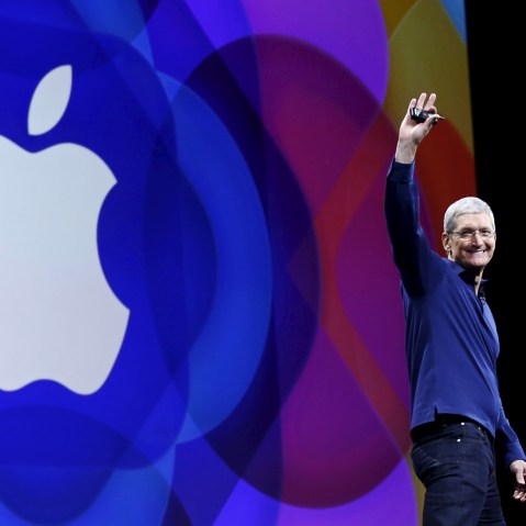 Apple CEO Tim Cook waves as he arrives on stage to deliver his keynote address at the Worldwide Developers Conference in San Francisco, Calif., June 8, 2015. (Photo by Robert Galbraith/Reuters)