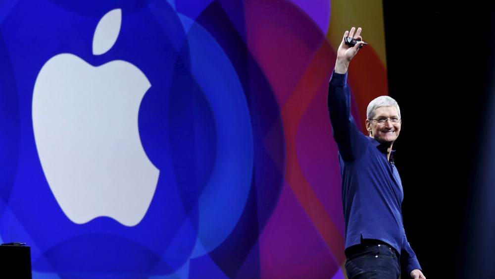 Apple CEO Tim Cook waves as he arrives on stage to deliver his keynote address at the Worldwide Developers Conference in San Francisco, Calif., June 8, 2015. (Photo by Robert Galbraith/Reuters)