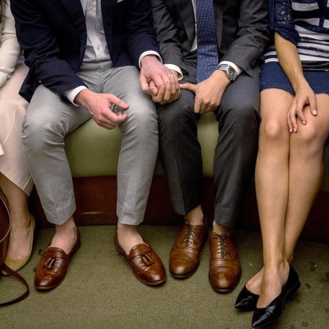 Ashby Hardesty (2nd L) and Rodrigo Zamora (C) hold hands as they wait with friends for their wedding ceremony at the New York City clerk's office in Manhattan, N.Y., June 26, 2015. (Photo by Brendan McDermid/Reuters)