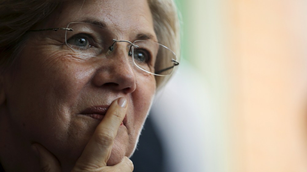 U.S. Senator Elizabeth Warren listens to workers tell their stories about erratic workplace schedules at the Equal Exchange Cafe in Boston, Mass., July 20, 2015. (Photo by Brian Snyder/Reuters)