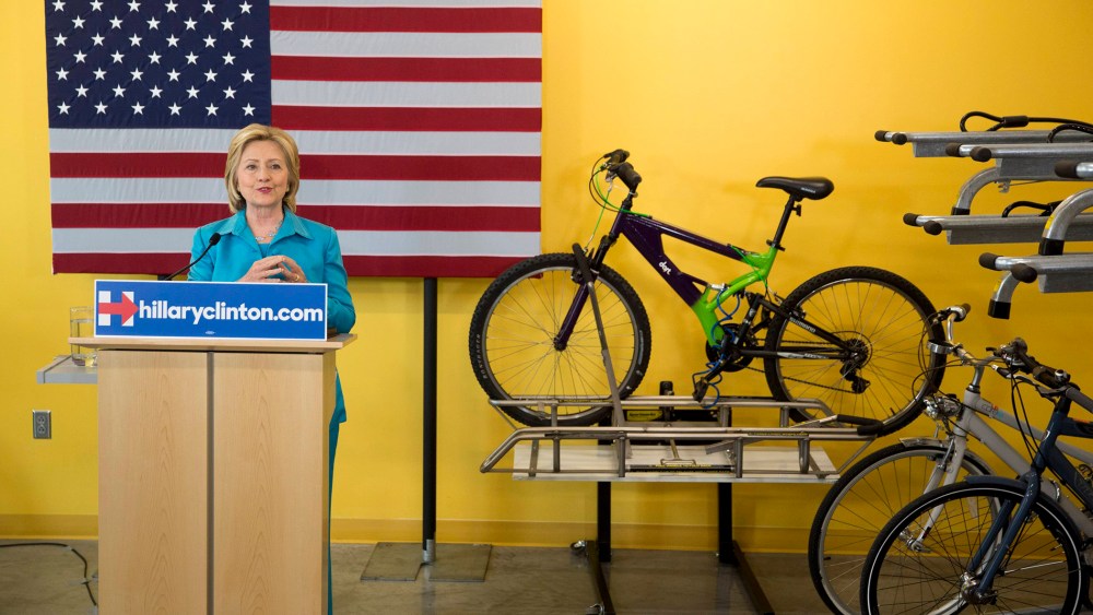 Democratic presidential hopeful Clinton talks about her environmental plan during a visit to the DART Central Station in Des Moines (Photo by Stringer/Reuters).