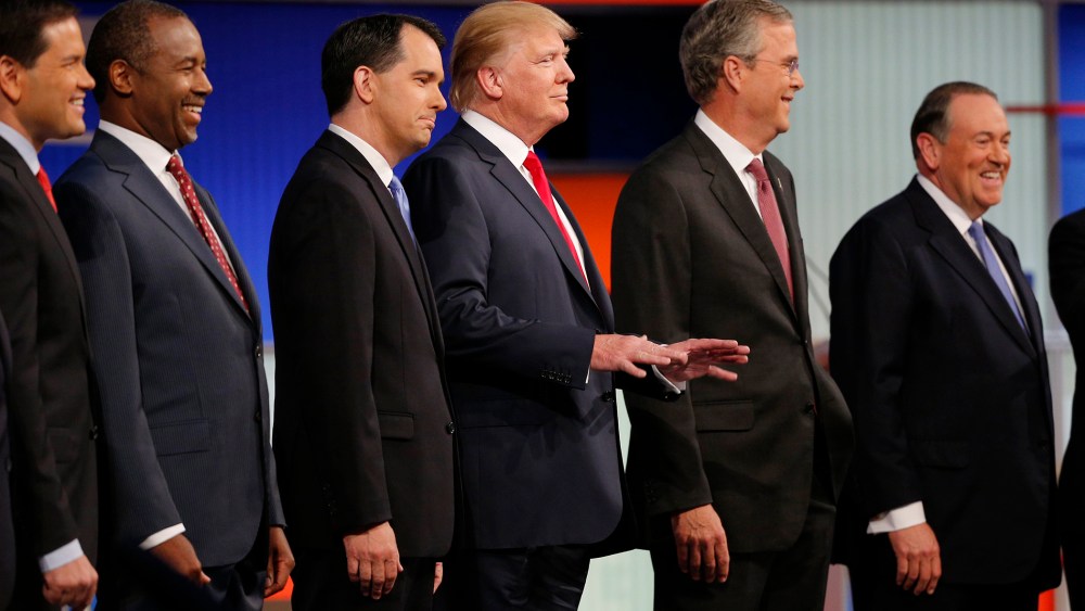 Republican 2016 presidential candidates pose at the start of the first official Republican presidential candidates debate of the 2016 U.S. presidential campaign in Cleveland