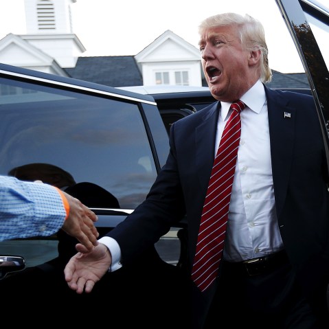 U.S. Republican presidential candidate Donald Trump is greeted as he arrives at a campaign fundraiser at the home of car dealer Ernie Boch Jr. in Norwood, Massachusetts August 28, 2015. (Photo by Brian Snyder/Reuters)
