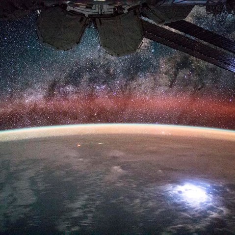 A large lightning strike on Earth lights up solar panels on the International Space Station in this NASA picture taken by astronaut Kjell Lindgren released Sep. 2, 2015. (Photo by Kjell Lindgren/Nasa/Reuters)