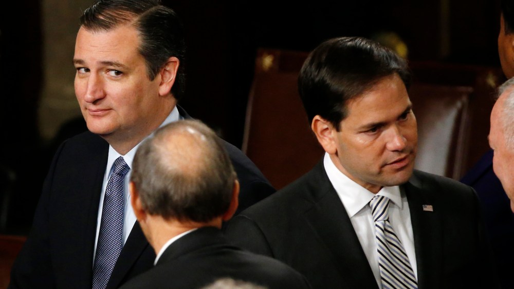 Republican U.S. presidential candidate and Senator Ted Cruz looks over at rival candidate Senator Marco Rubio after Pope Francis' address on Capitol Hill in Washington, DC. Sept. 24, 2015. (Photo by James Lawler Duggan/Reuters)