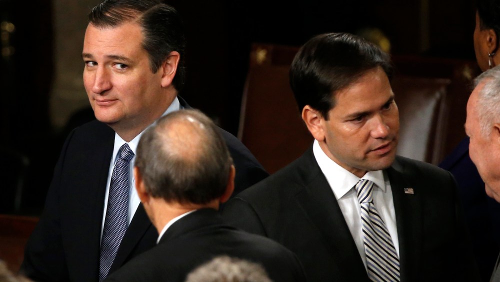Republican U.S. presidential candidate and Senator Ted Cruz (L) looks over at rival candidate Senator Marco Rubio on Capitol Hill in Washington, D.C., on Sept. 24, 2015. (Photo by James Lawler Duggan/Reuters)