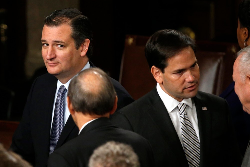 Republican U.S. presidential candidate and Senator Ted Cruz (L) looks over at rival candidate Senator Marco Rubio on Capitol Hill in Washington, D.C., on Sept. 24, 2015. (Photo by James Lawler Duggan/Reuters)