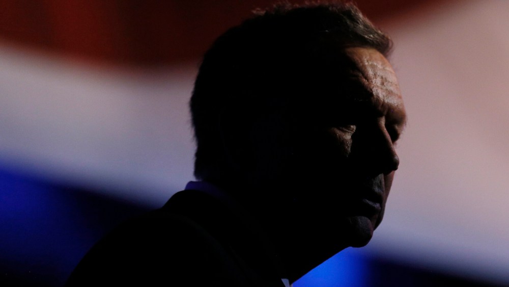 Republican U.S. presidential candidate and Ohio Governor John Kasich stands at his podium after the stage lights dimmed following the 2016 U.S. Republican presidential debate held by CNBC in Boulder, Colo., Oct. 28, 2015. (Photo by Rick Wilking/Reuters)