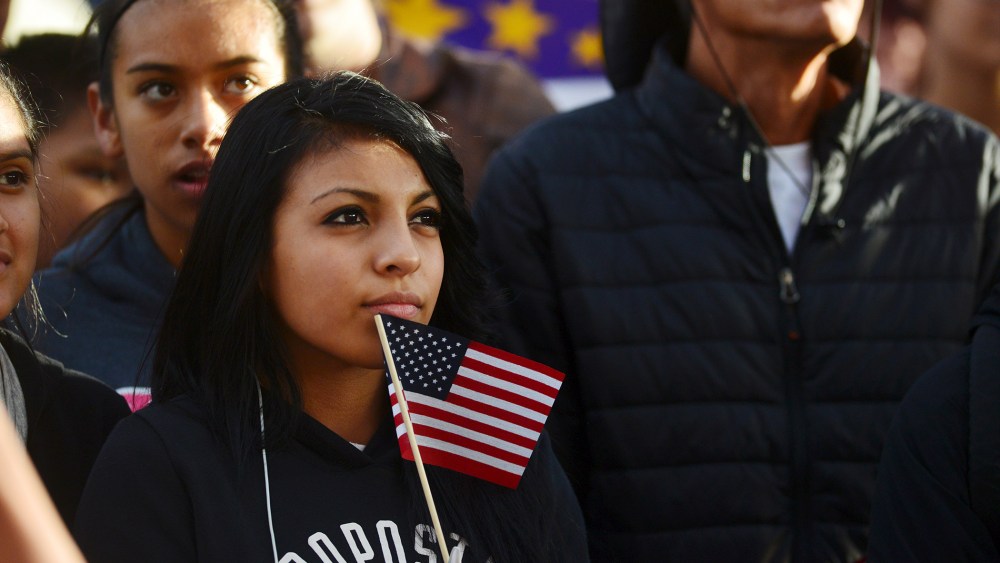 Latino leaders and immigration reform supporters gather outside the third Republican presidential debate held by CNBC in Boulder, Colo., Oct. 28, 2015. (Photo by Evan Semon/Reuters)