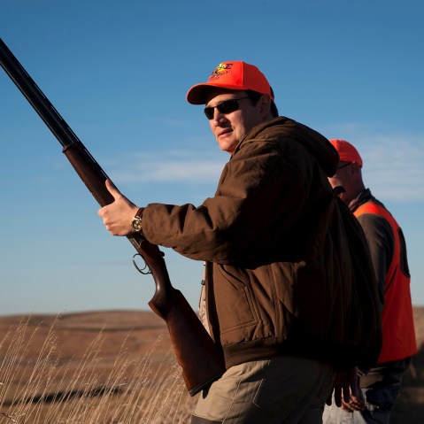 U.S. Republican presidential candidate Sen. Ted Cruz pauses before heading further down field during the Col. Bud Day Pheasant Hunt hosted by Congressman Steve King outside of Akron, Ia., Oct. 31, 2015. (Photo by Mark Kauzlarich/Reuters)