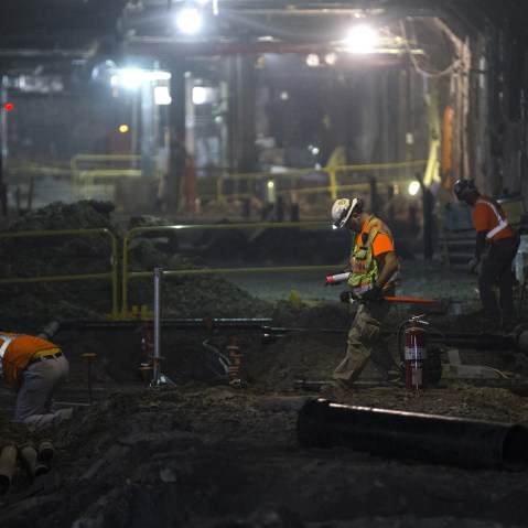 Sandhogs work in a tunnel in the East Side Access project in New York, Nov. 4, 2015. (Photo by Mike Segar/Reuters)