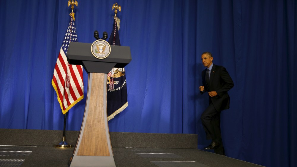 U.S. President Barack Obama Obama takes the stage for a news conference at the conclusion of his visit to Paris, Dec. 1, 2015. (Photo by Kevin Lamarque/Reuters)