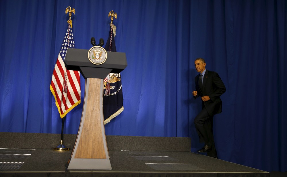 U.S. President Barack Obama Obama takes the stage for a news conference at the conclusion of his visit to Paris, Dec. 1, 2015. (Photo by Kevin Lamarque/Reuters)