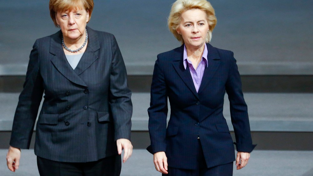 German Chancellor Angela Merkel and Defense Minister Ursula von der Leyen (R) walk during a session of the Bundestag, the German lower house of parliament, in Berlin, Germany, Dec. 4, 2015. (Photo by Hannibal Hanschke/Reuters)