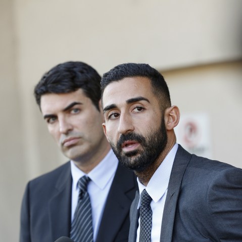 Lawyers representing the Farook family, David S. Chesley and Mohammad Abuershaid (R), speak during a news conference in Los Angeles, Calif., Dec. 4, 2015. (Photo by Patrick T. Fallon/Reuters)