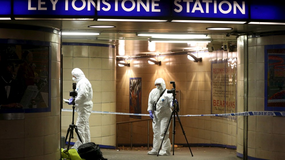 Emergency responders investigate a crime scene at Leytonstone underground station in east London, Britain, Dec. 6, 2015. (Photo by Neil Hall/Reuters)