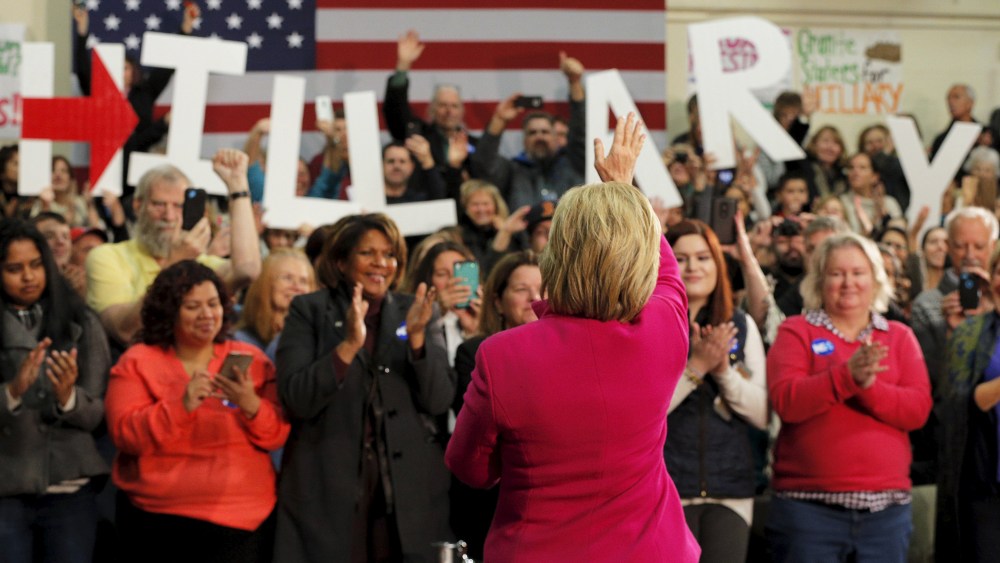U.S. Democratic presidential candidate Hillary Clinton takes the stage for a campaign town hall meeting in Salem, N.H., Dec. 8, 2015. (Photo by Brian Snyder/Reuters)