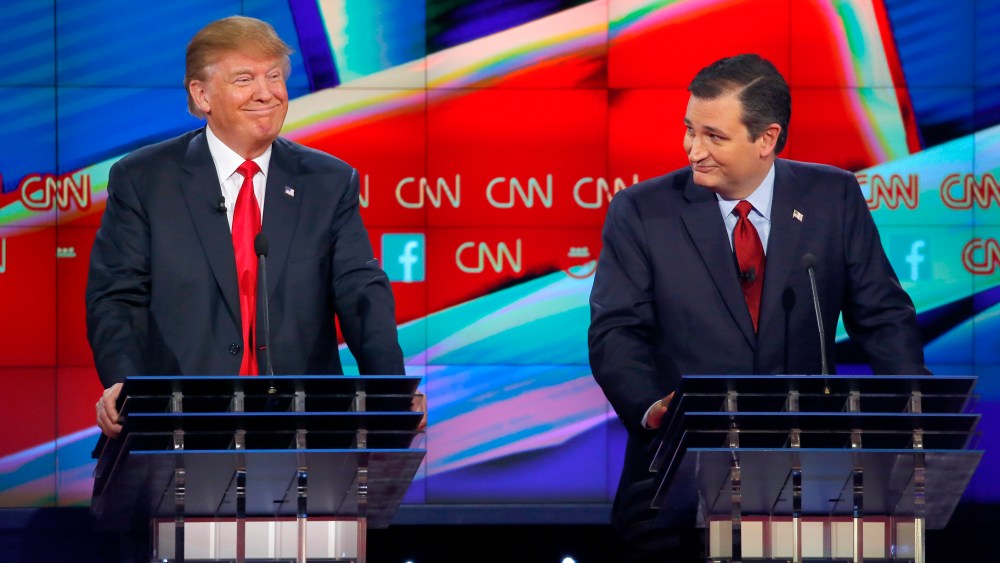 Republican presidential candidate Donald Trump smiles after rival candidate Ted Cruz advocated building a border wall and said Trump should pay for it, during the presidential debate in Las Vegas, Nev., Dec. 15, 2015. (Photo by Mike Blake/Reuters)