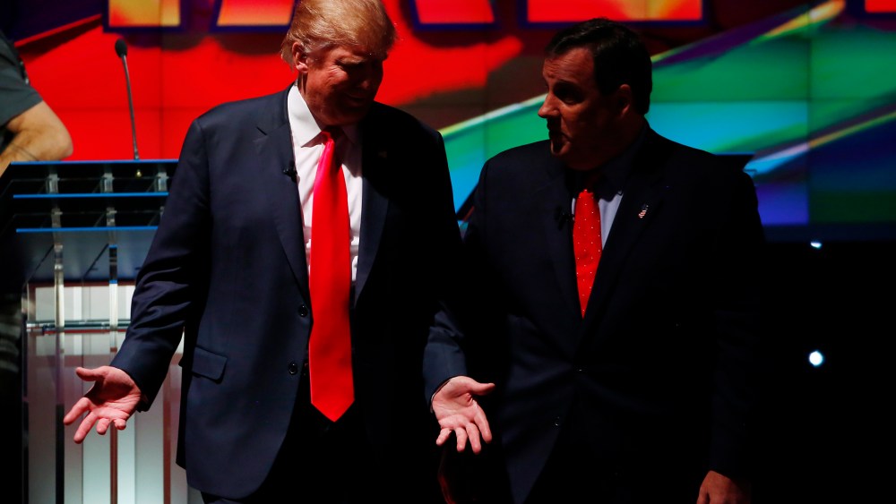 Republican U.S. presidential candidates Donald Trump and Chris Christie talk during a commercial break of the Republican presidential debate in Las Vegas, Nev., Dec. 15, 2015. (Photo by Mike Blake/Reuters)