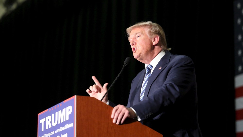 U.S. Republican presidential candidate Donald Trump speaks during a campaign rally in Council Bluffs, Iowa, Dec. 29, 2015. (Photo by Lane Hickenbottom/Reuters)
