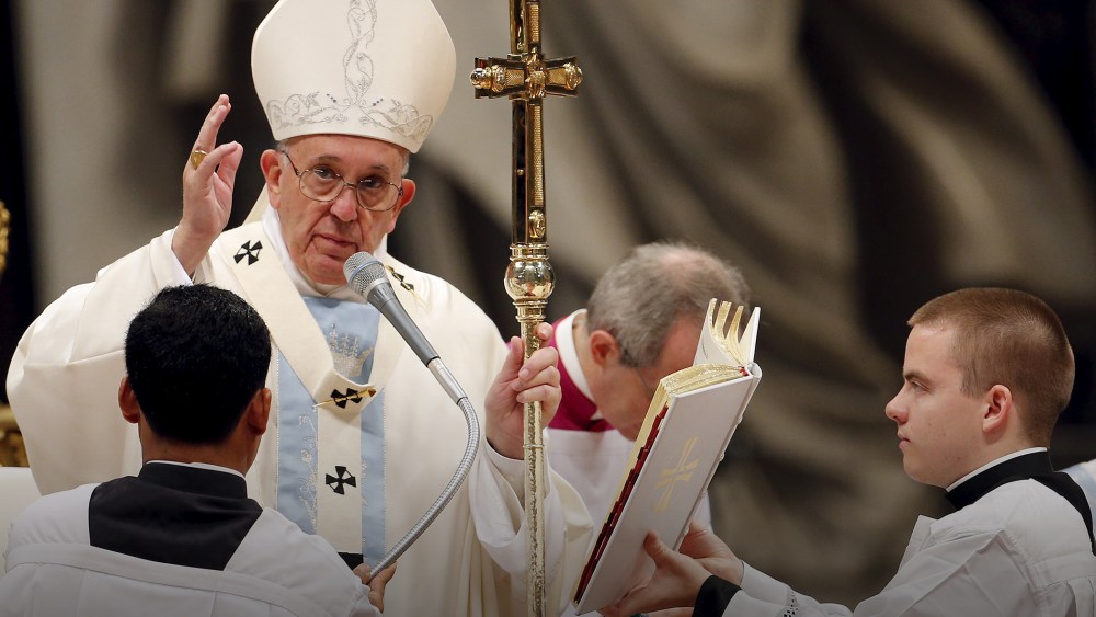 Pope Francis blesses at the end of a mass on New Year's Day at Saint Peter's Basilica at the Vatican, Jan. 1, 2016. (Photo by Giampiero Sposito/Reuters)