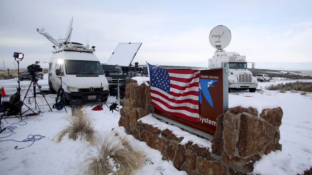 Media and satellite trucks are seen at the Malheur National Wildlife Refuge near Burns, Ore., Jan. 4, 2016. (Photo by Jim Urquhart/Reuters)