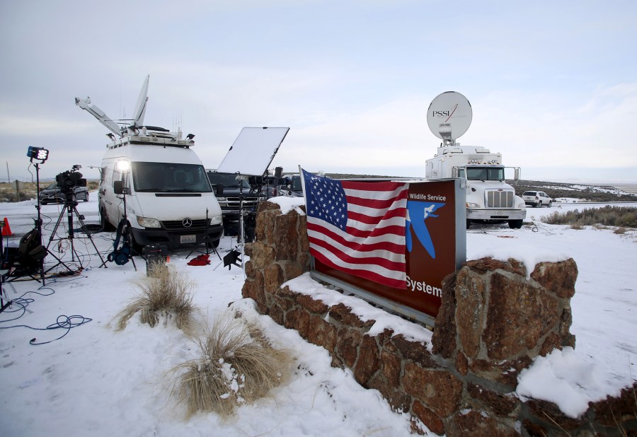 Media and satellite trucks are seen at the Malheur National Wildlife Refuge near Burns, Ore., Jan. 4, 2016. (Photo by Jim Urquhart/Reuters)