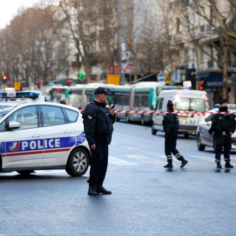 French police secure the area after a man was shot dead at a police station in the 18th district in Paris, France on Jan. 7, 2016. (Photo by Charles Platiau/Reuters)