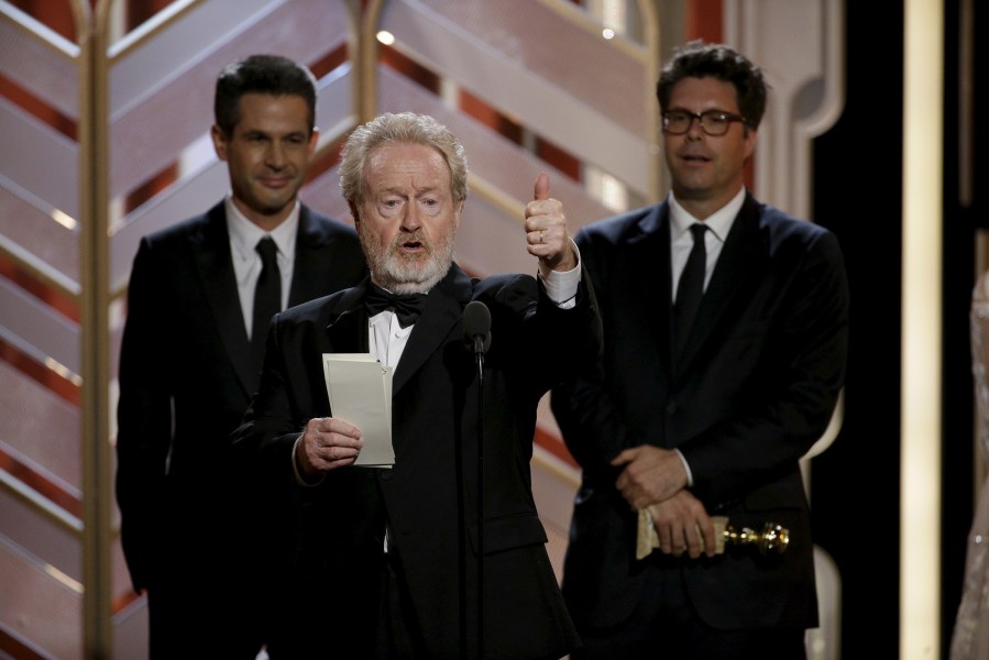 Director Ridley Scott accepts the award after 