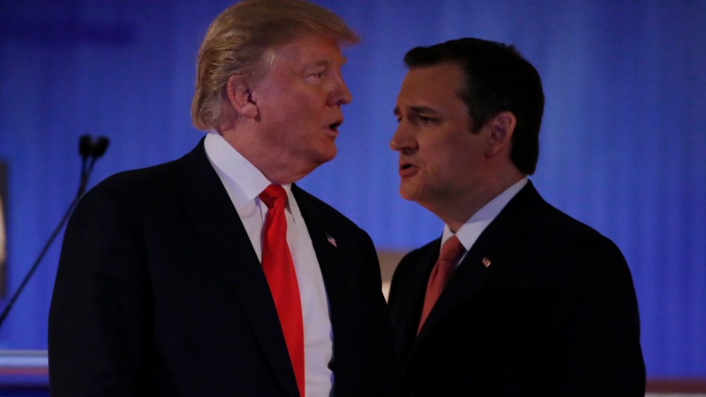 Republican U.S. presidential candidates Donald Trump and Ted Cruz cross paths during a break at the Fox Business Network Republican presidential candidates debate in North Charleston, S.C., Jan. 14, 2016. (Photo by Chris Keane/Reuters)
