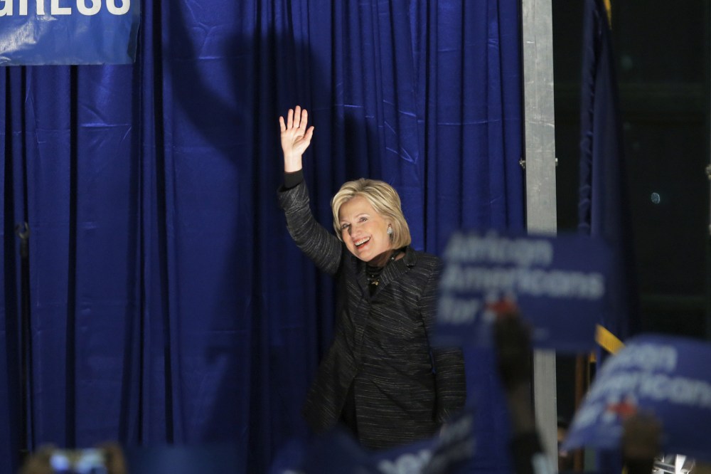 U.S. Democratic presidential candidate Hillary Clinton waves as she is announced on the stage during Jim Clyburn's Annual Fish Fry in Charleston, S.C., Jan. 16, 2016. (Photo by Chris Keane/Reuters)