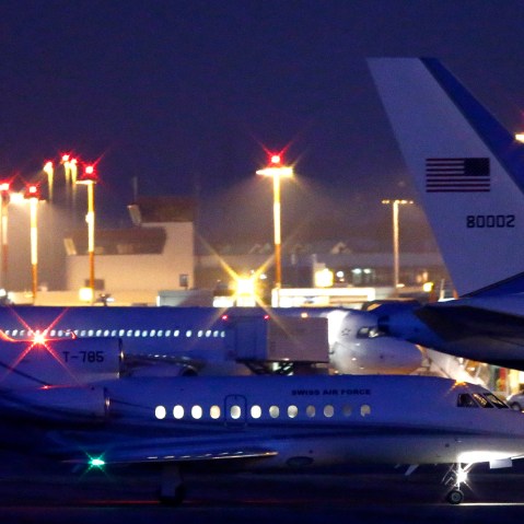 A plane (L) carrying three Iranian-Americans, who left Tehran under a prisoner swap, lands at Cointrin airport in Geneva, Switzerland on Jan. 17, 2016. (Photo by Denis Balibouse/Reuters)