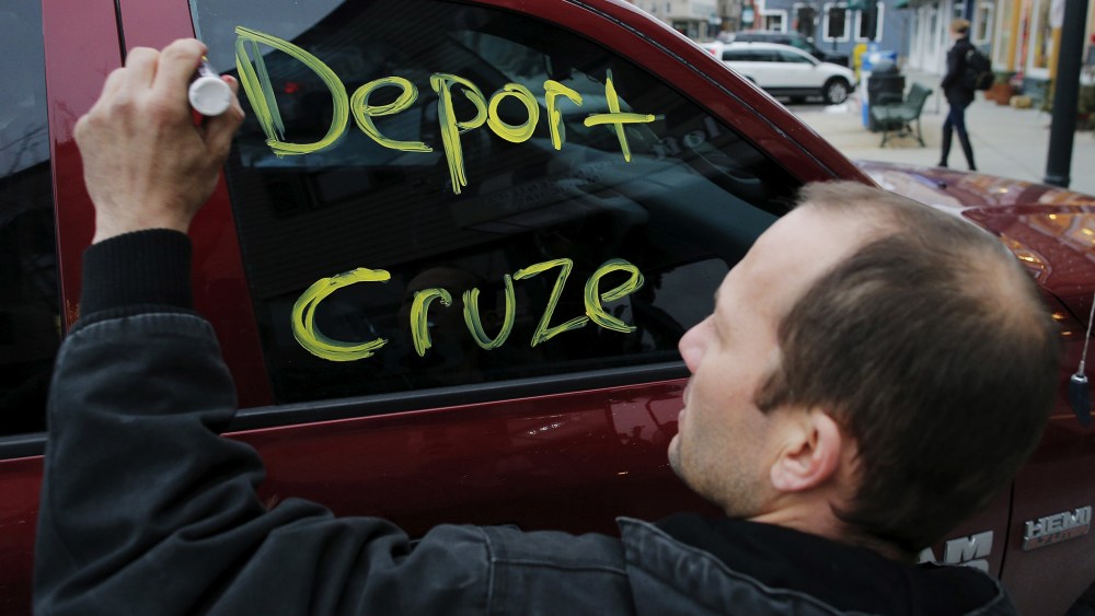 A man writes a message on his own truck's window outside a campaign stop by Republican presidential candidate and Senator Ted Cruz in Milford, N.H., Jan. 17, 2016. (Photo by Brian Snyder/Reuters)