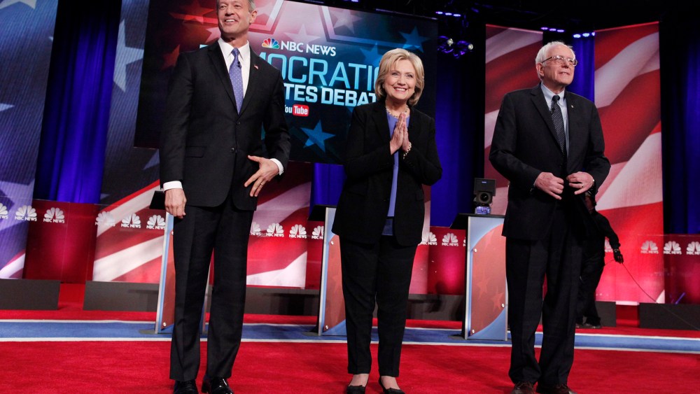 Democratic U.S. presidential candidates Martin O'Malley, Hillary Clinton and Senator Bernie Sanders pose together before the start of the NBC News - YouTube Democratic presidential candidates debate, Jan. 17, 2016. (Photo by Randall Hill/Reuters)