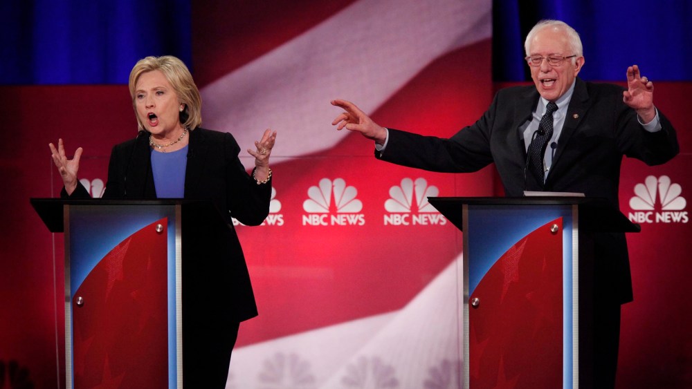 Democratic U.S. presidential candidates Hillary Clinton and Senator Bernie Sanders speak simultaneously at the NBC News - YouTube Democratic presidential candidates debate in Charleston, S.C., Jan. 17, 2016. (Photo by Randall Hill/Reuters)